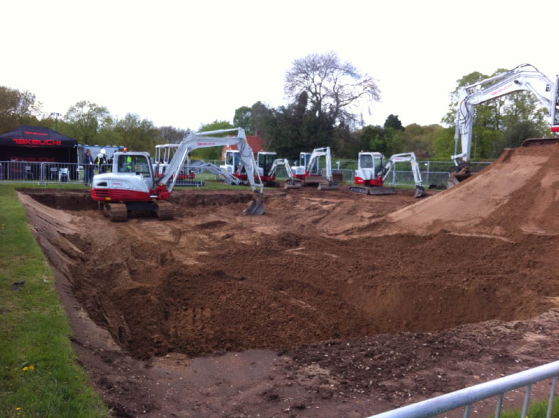 A Takeuchi digger working on a demonstration.